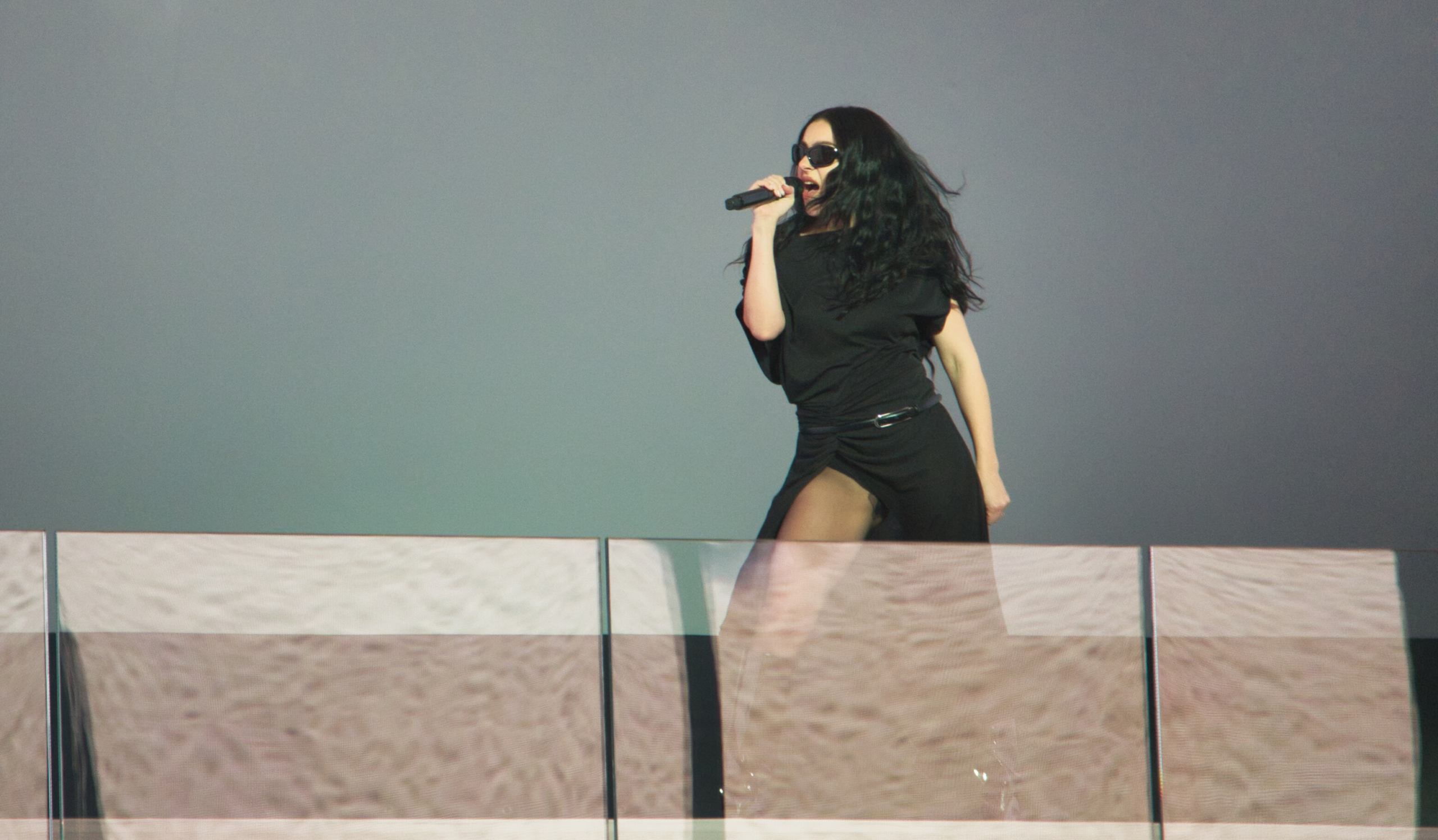 Charli XCX gives a free pop-up concert in collaboration with H&M, performing a "Brat" setlist in Times Square on Monday, Nov. 18, 2024. | Photo by Setoxxx via Wikimedia Commons, licensed under CC BY-SA 4.0. Charli XCX gives a free pop-up concert in collaboration with H&M, performing a "Brat" setlist in Times Square on Monday, Nov. 18, 2024. | Photo by Setoxxx via Wikimedia Commons, licensed under CC BY-SA 4.0.